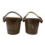 Two teak and brass bound fire buckets