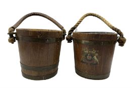 Two teak and brass bound fire buckets