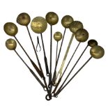 Collection of 19th century and later wrought iron and brass ladles and strainers etc