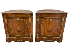 Pair of 20th century French walnut barrel-backed corner cupboards