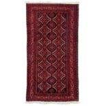Persian red and indigo ground rug
