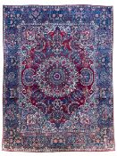 Antique Persian crimson ground carpet