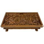 Carved hardwood coffee table