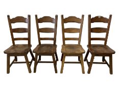 Set four early 20th century solid oak dining chairs
