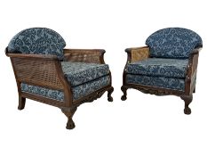 Pair of early 20th century mahogany framed bergere armchairs