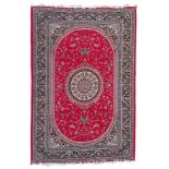 Persian design crimson ground rug