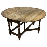 18th century oak drop-leaf oval dining table