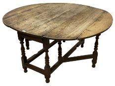 18th century oak drop-leaf oval dining table