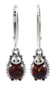 Pair of silver amber hedgehog pendant stud earrings