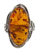 Silver oval Baltic amber ring