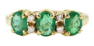 18ct gold three stone oval cut emerald and diamond ring