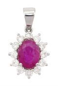 18ct white gold oval cut ruby and round brilliant cut diamond cluster pendant