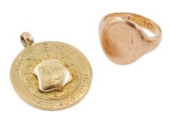 Early 20th century rose gold signet ring and a rose gold medallion