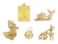 Five 9ct gold pendant / charms including lady with a pram