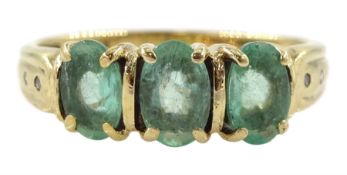 9ct gold three stone emerald ring