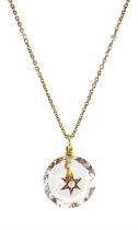 Victorian rock crystal pendant set with a central gold split pearl and diamond star