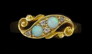 Early 20th century 18ct gold opal and old cut diamond scroll ring
