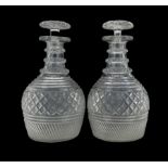Pair of early 19th century Irish glass decanters with hobnail cut decoration and triple ring necks a