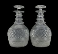 Pair of early 19th century Irish glass decanters with hobnail cut decoration and triple ring necks a