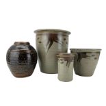 Three pieces of studio pottery by Donald Glanville (British b. 1977) comprising two planters and vas