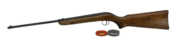 Early 20th century BSA .177 air rifle No.B33956 with walnut stock and a tin of BSA pellets
