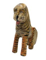 Indian carved polychrome painted model of a seated Tiger