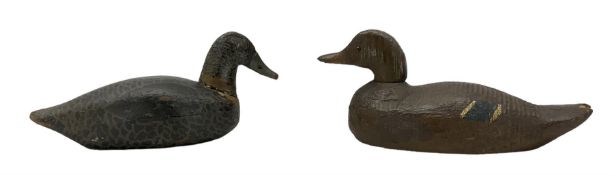 Two 20th century carved wood and polychrome painted decoy ducks
