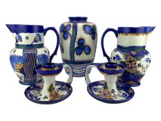 Carlton ware - pair of ' Papyrus' pattern jugs no. 3242