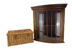 Small mahogany bow fronted corner wall cupboard and a Fortnum & Mason wicker picnic basket (2)