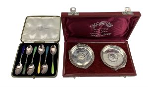 Pair of cased Indian silver dishes and a set of six silver plate and enamel harlequin teaspoons