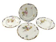 Set of four late Victorian Royal Crown Derby plates each painted with Spring flowers within a moulde