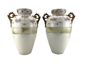 Pair of two handled floral vases