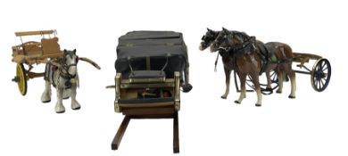 Three pottery cart horses and carts