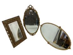 Oval gilt framed wall mirror (69cm x 38cm); rectangular gilt framed wall mirror (53cm x 35cm); and a
