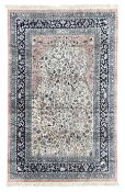Persian design pale pink and ivory ground rug