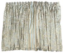 Two thermal lined curtains in gold and pale blue brocade patterned fabric with striped edges