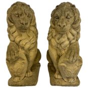 Pair of weathered cast stone garden statues