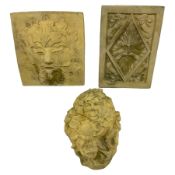 Cast stone wall plaque or mask in the form of a feminised Green Man