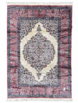 Persian design ivory and pink ground rug