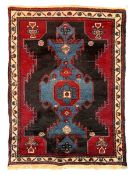 Persian Tuyserkan crimson ground rug