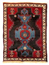 Persian Tuyserkan crimson ground rug
