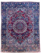 Antique Persian crimson ground carpet