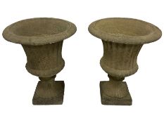 Pair of large Victorian design cast stone garden urns