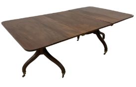George III mahogany twin pillar extending dining table