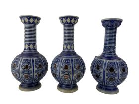 Three German bottle form salt glaze vases (3)