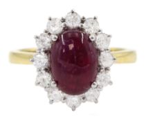 18ct gold oval cabochon ruby and round brilliant cut diamond cluster ring