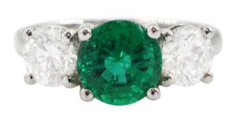 18ct white gold three stone emerald and round brilliant cut diamond ring