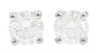 Pair of 18ct white gold round brilliant cut diamond earrings