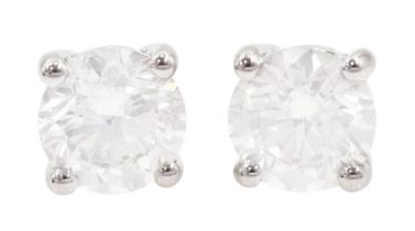 Pair of 18ct white gold round brilliant cut diamond earrings