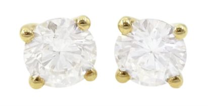 Pair of 18ct gold round brilliant cut diamond stud earrings